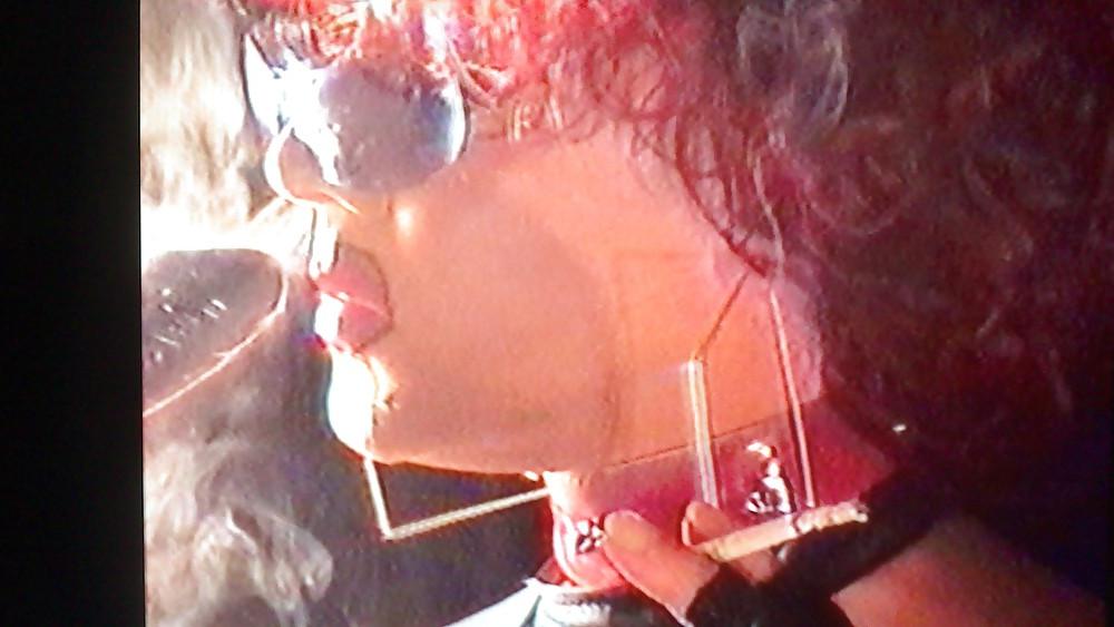 14P Redhead smoking TV tart