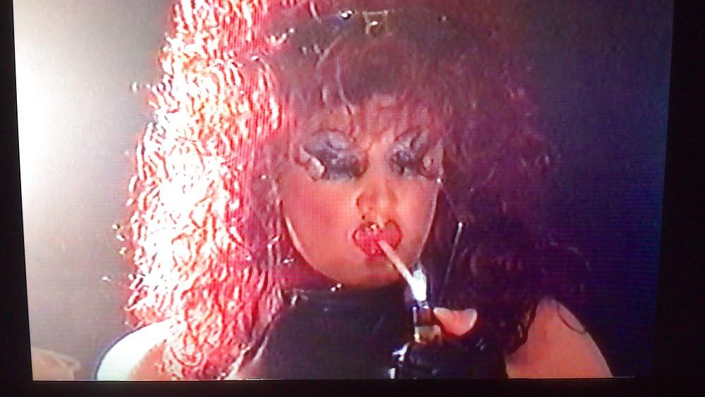 14P Redhead smoking TV tart
