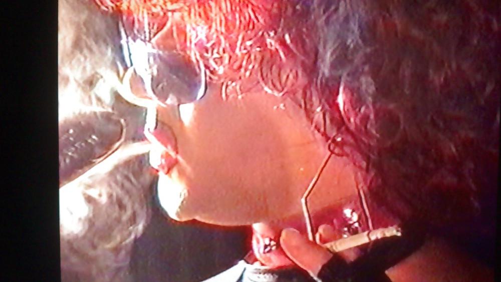 14P Redhead smoking TV tart
