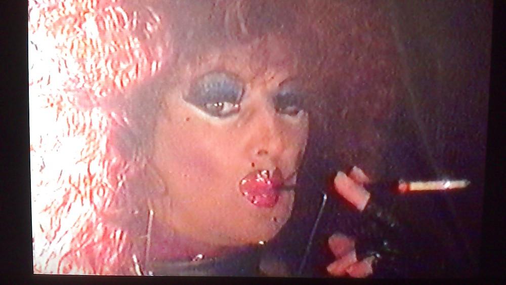 14P Redhead smoking TV tart