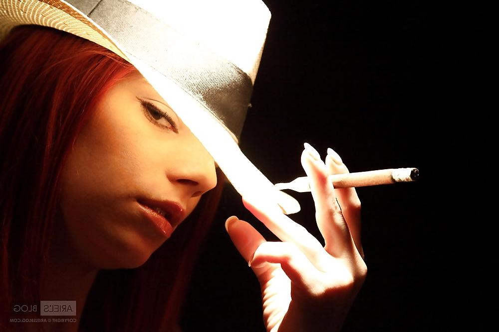 15P Smoking teen redhead.