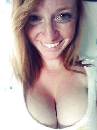 16P Cute redhead boobs