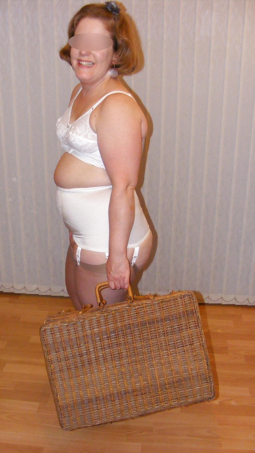 25P Slutty secretary in girdle, stockings, and boots