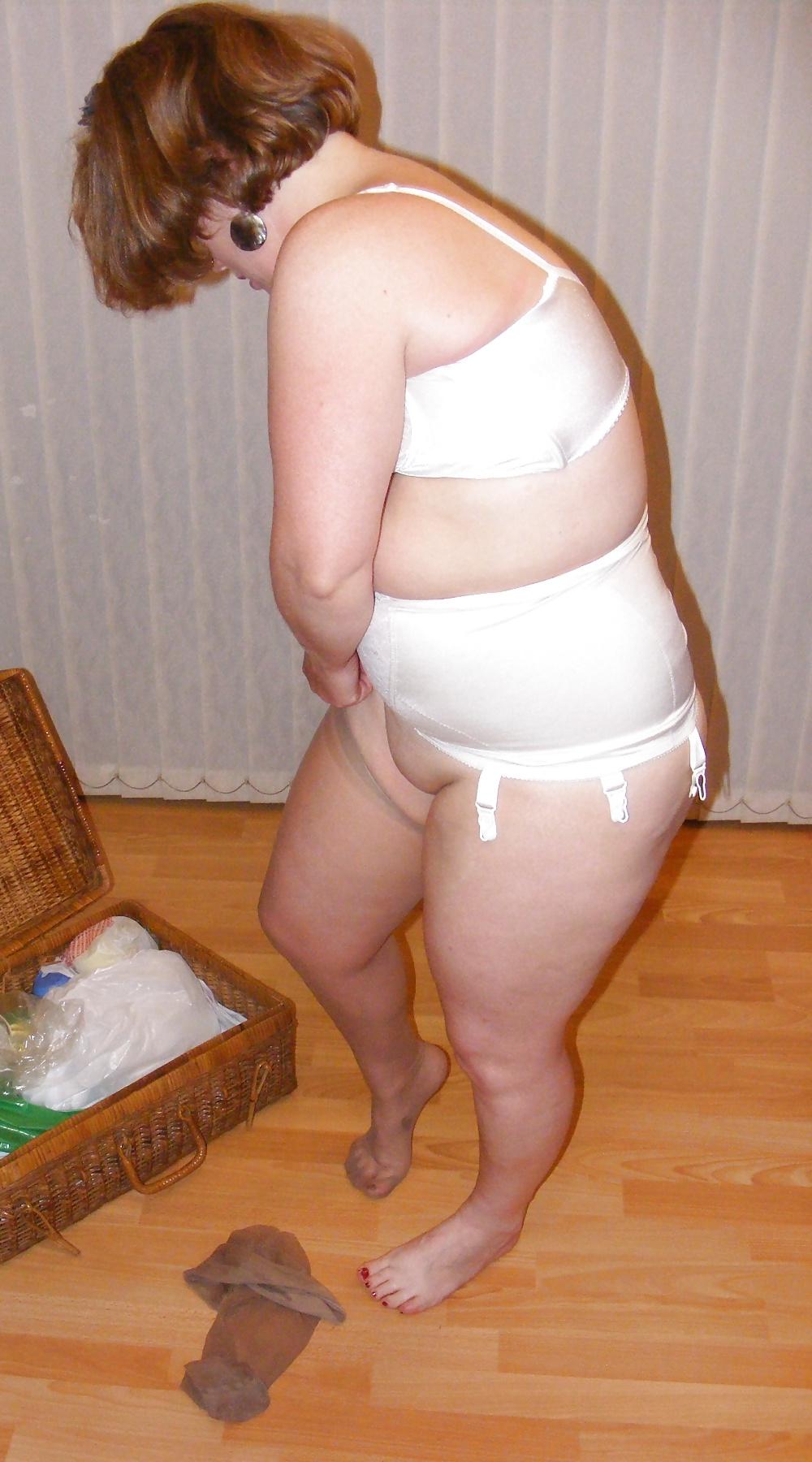 25P Slutty secretary in girdle, stockings, and boots