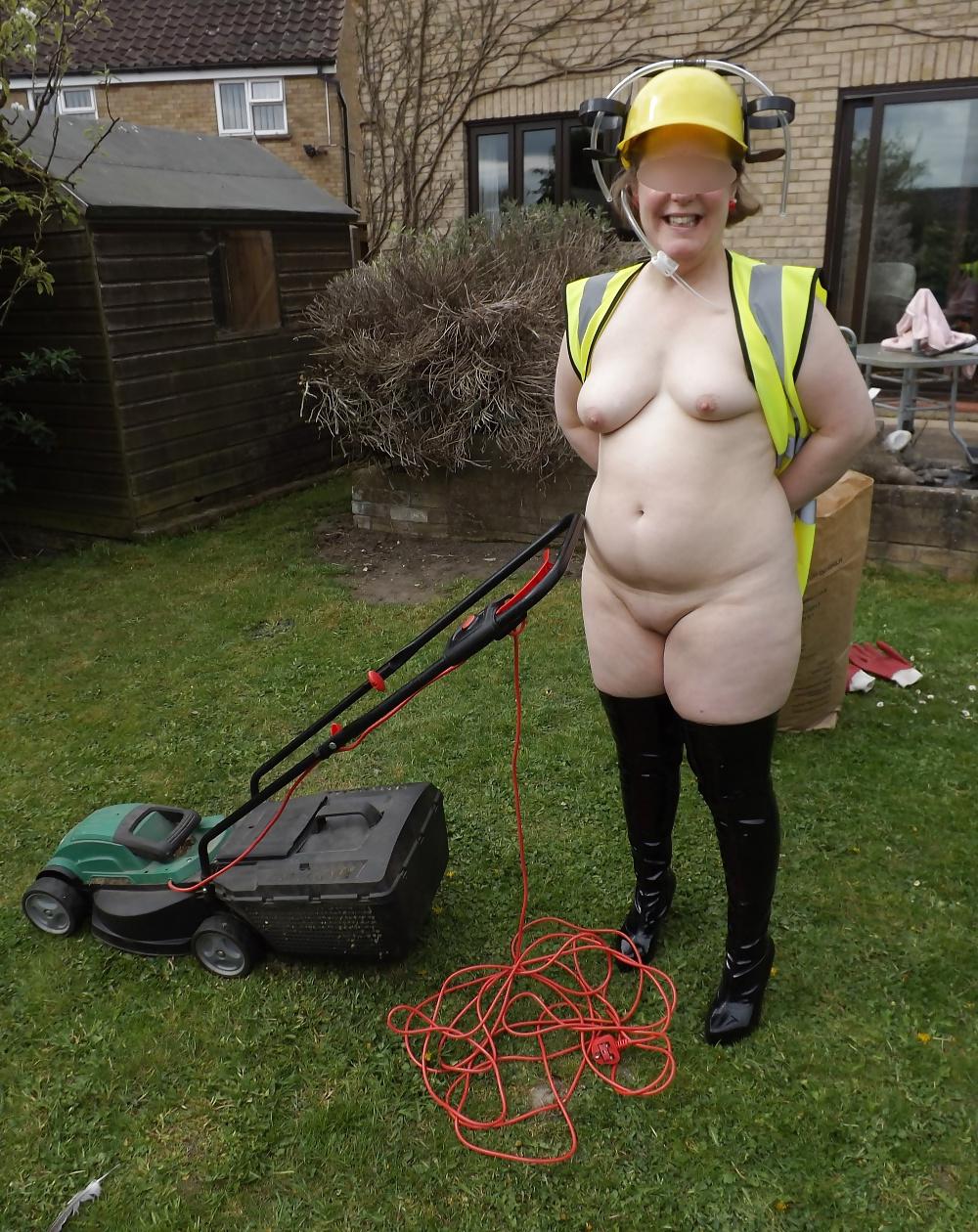 12P Mowing the lawn in PVC thigh boots