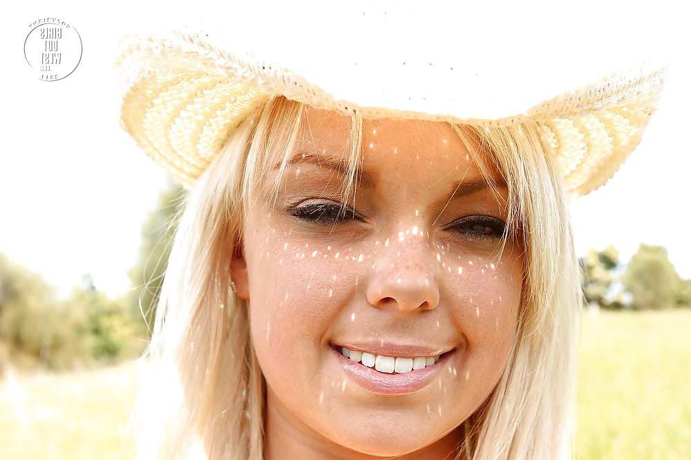16P Sexy Aussie cowgirl fingers her bald cunt outdoors