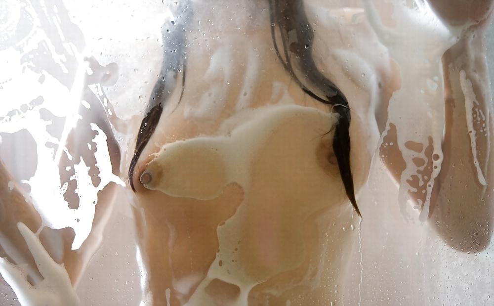 25P Boobs pressed against glass. Large and small.