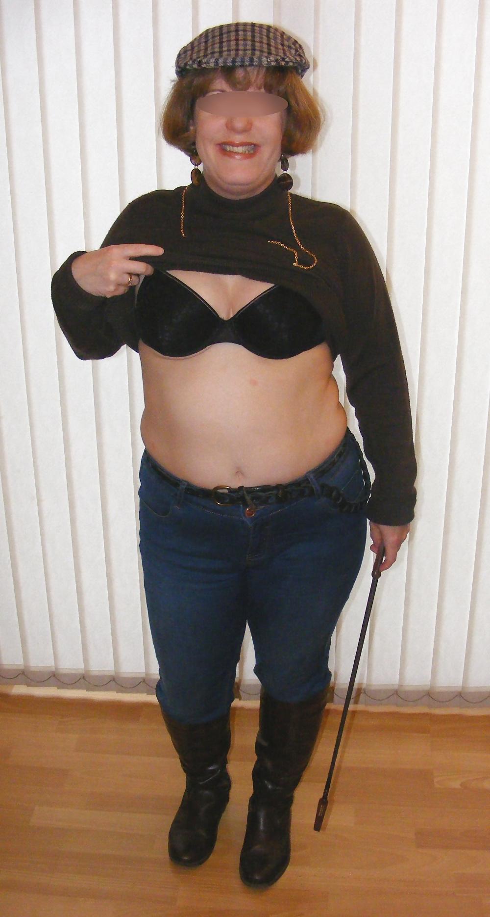 20P Mistress K in boots with riding crop