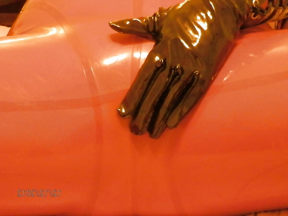 25P Mistress in her red latex catsuit