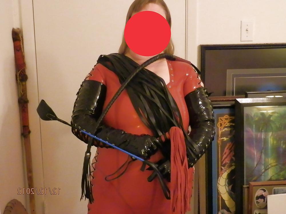 25P Mistress in her red latex catsuit