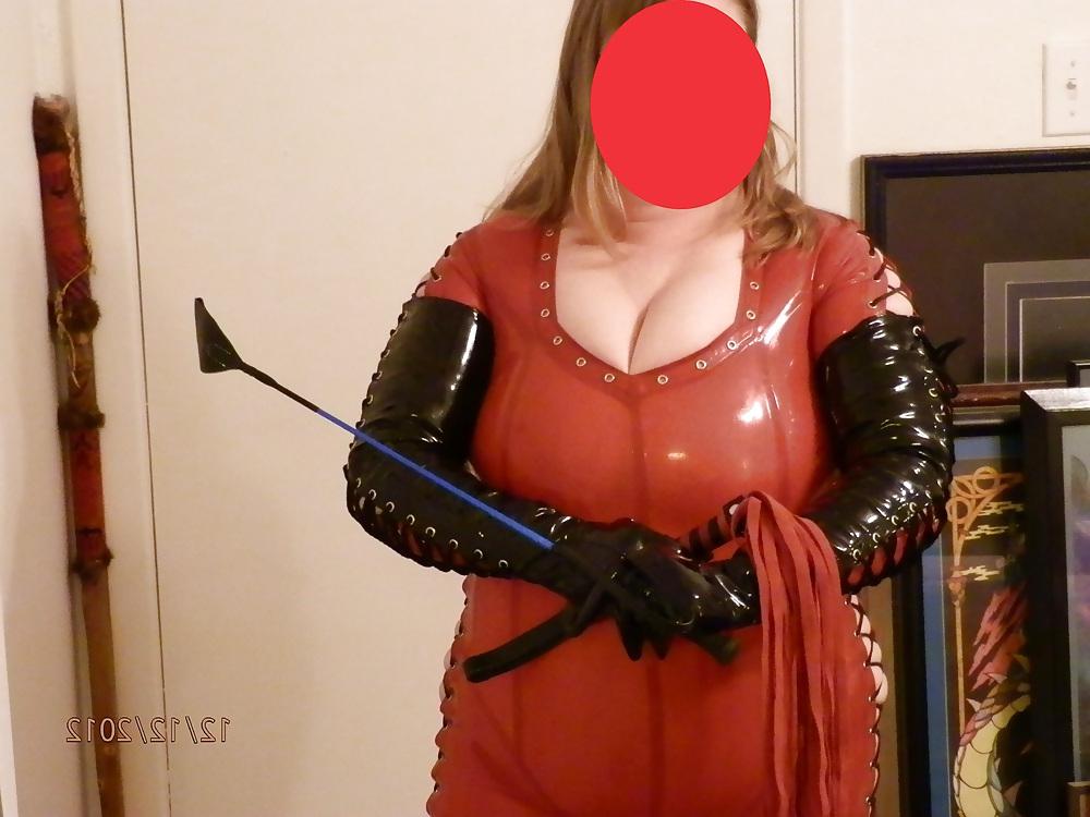 25P Mistress in her red latex catsuit