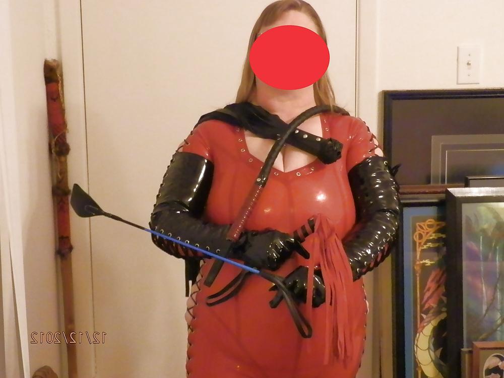 25P Mistress in her red latex catsuit