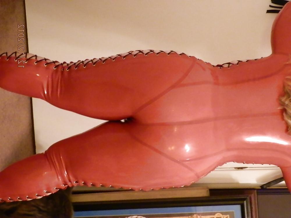 25P Mistress in her red latex catsuit