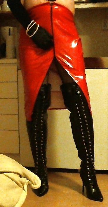 14P Me crossdressing in shiny red skirt & black lace up boots