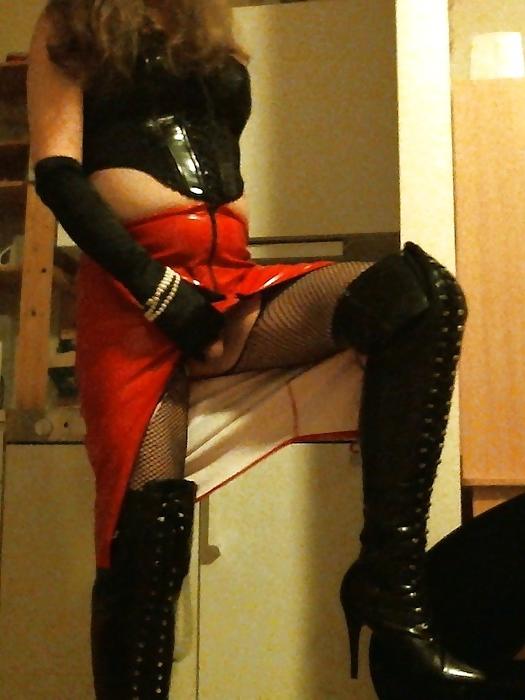 14P Me crossdressing in shiny red skirt & black lace up boots