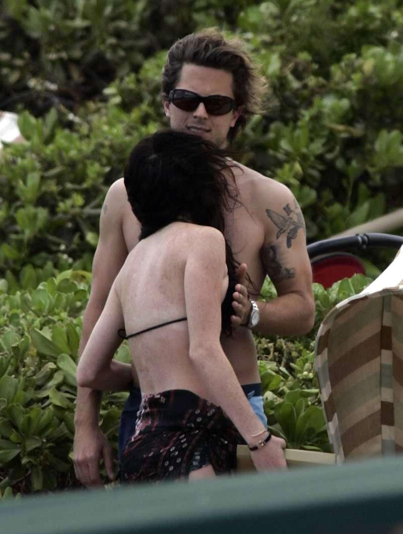 10P Lindsay Lohan having her boobs grabbbed at the beach