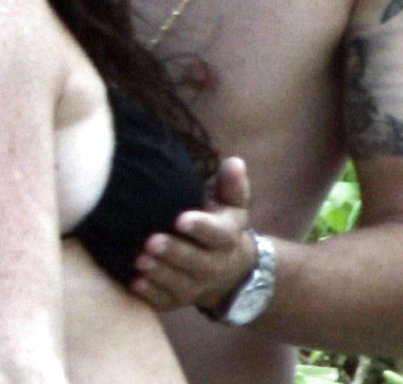 10P Lindsay Lohan having her boobs grabbbed at the beach
