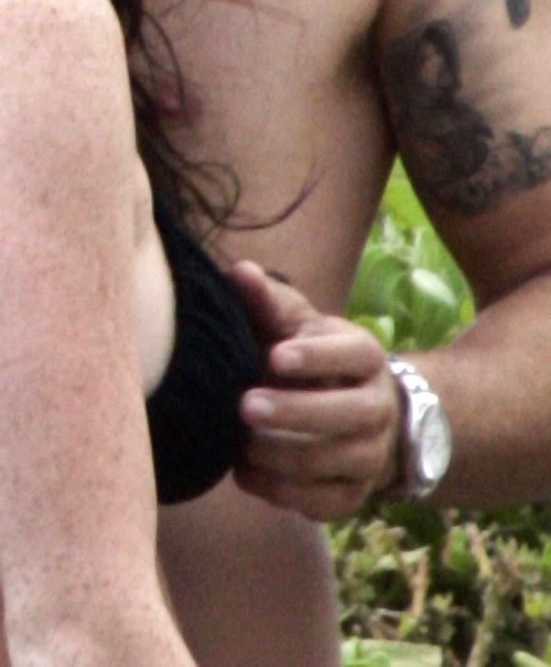 10P Lindsay Lohan having her boobs grabbbed at the beach