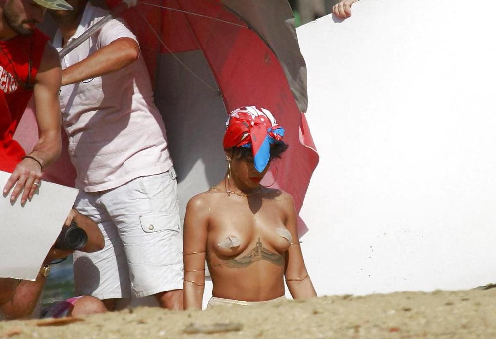 25P Rihanna Goes Topless For Vogue Brazil In Beach Photoshoot 