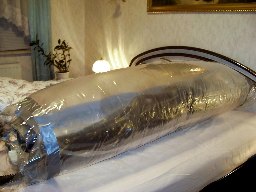 9P My wife in mummification, gas mask, inflatable bondage bag