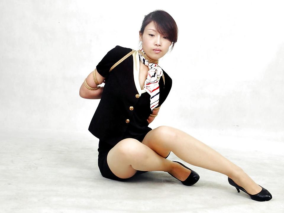 12P Chinese stewardess in bondage