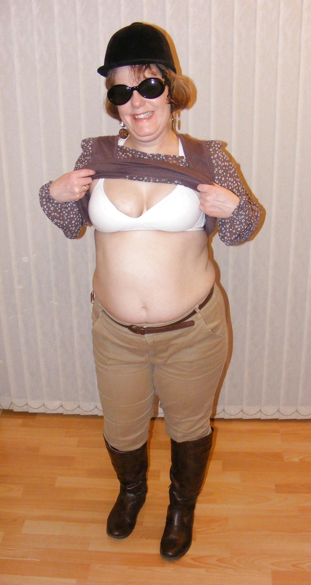 25P White knickers, boots, and riding crop