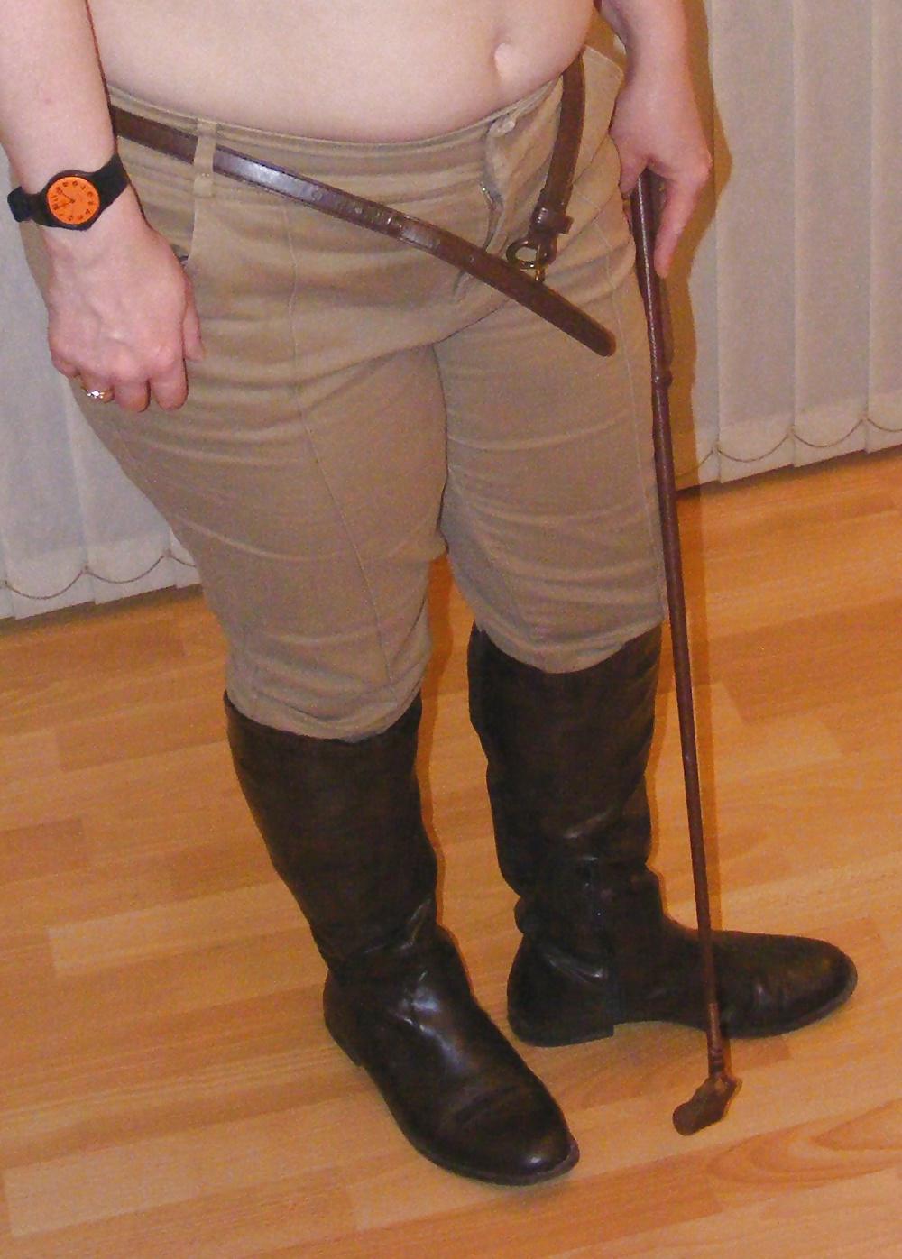 25P White knickers, boots, and riding crop