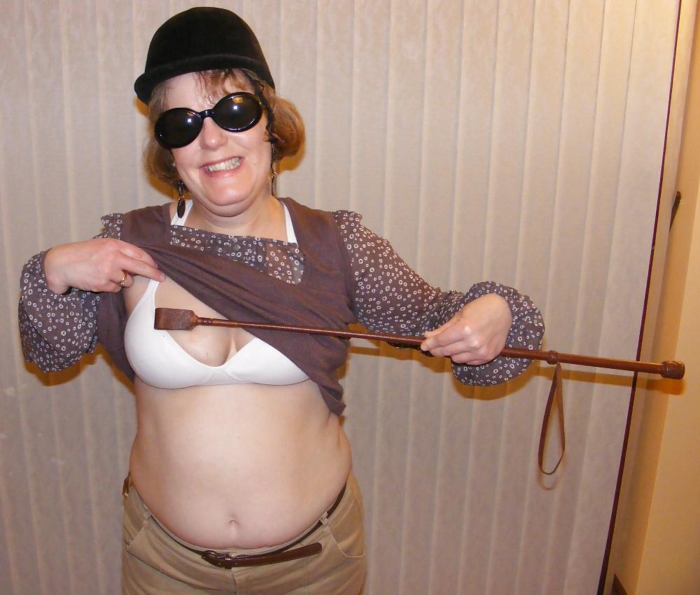 25P White knickers, boots, and riding crop
