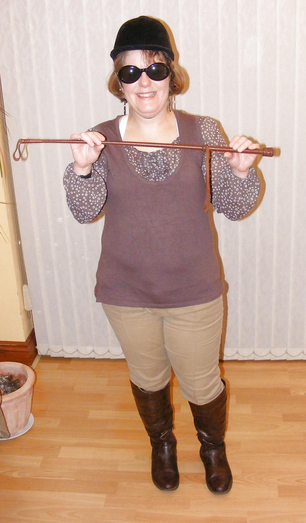 25P White knickers, boots, and riding crop