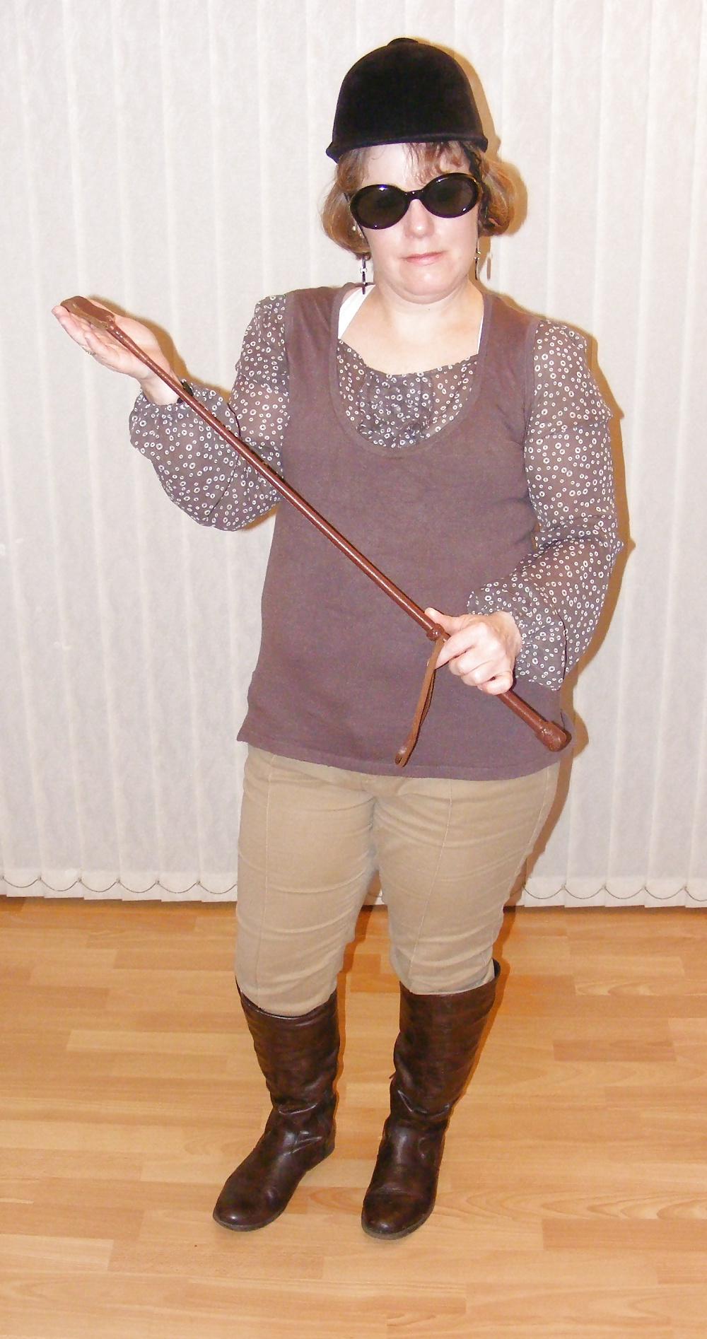 25P White knickers, boots, and riding crop