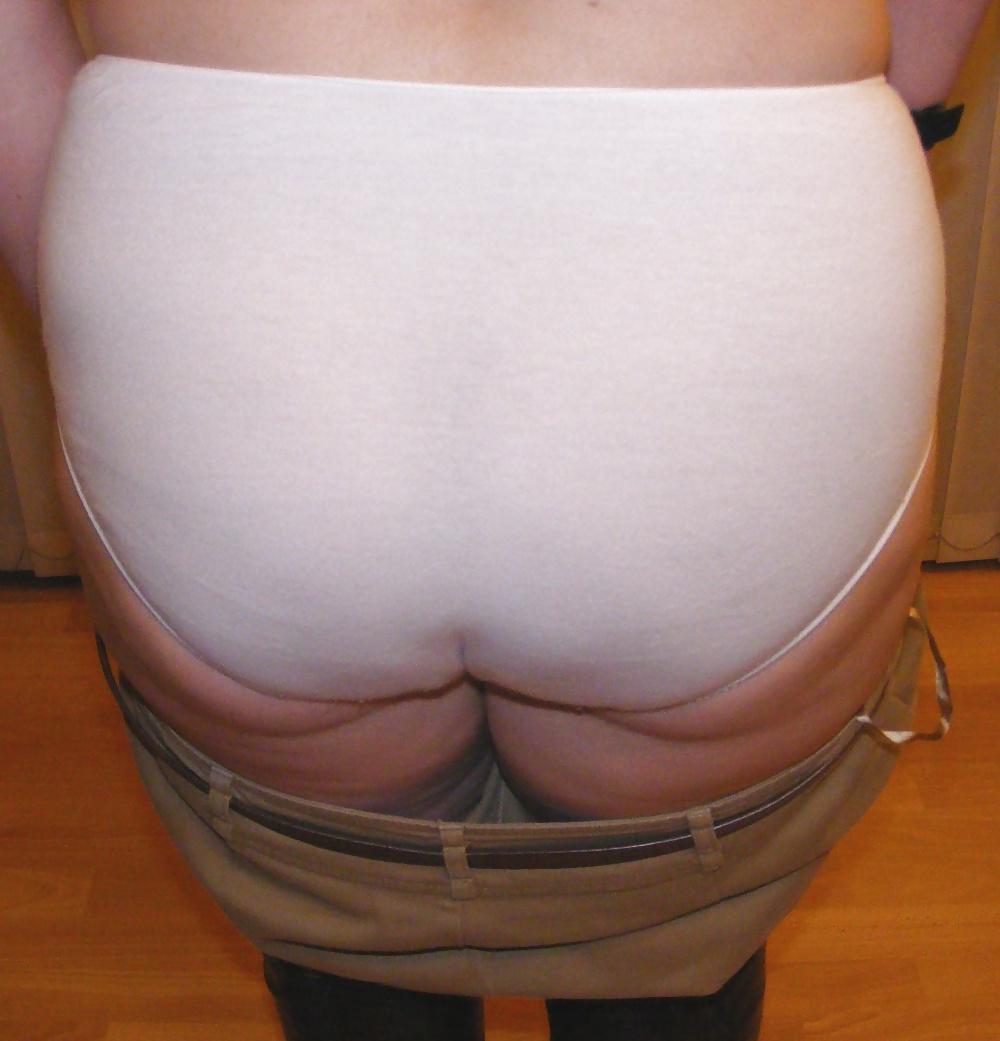 25P White knickers, boots, and riding crop