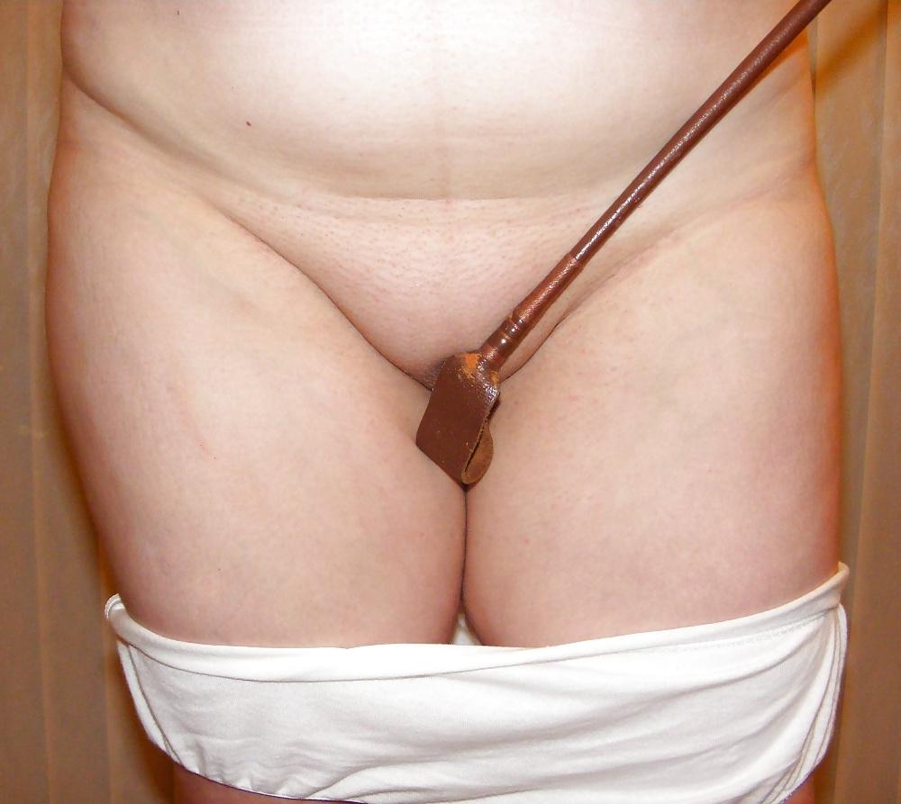 25P White knickers, boots, and riding crop