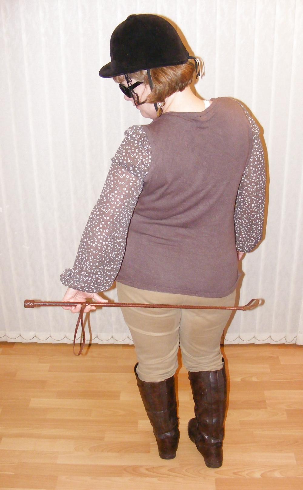 25P White knickers, boots, and riding crop