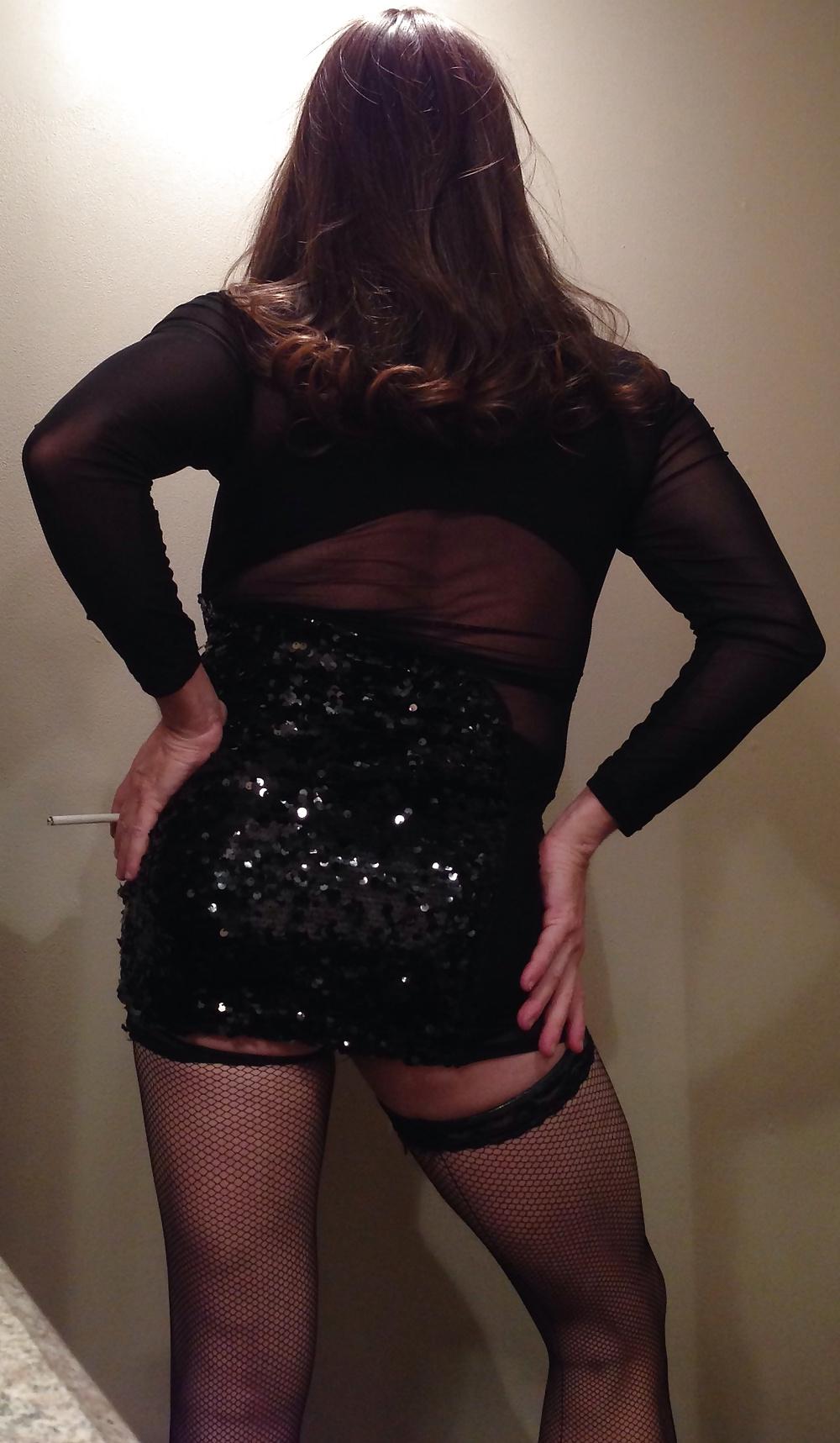 11P New black dress with big tits smoking