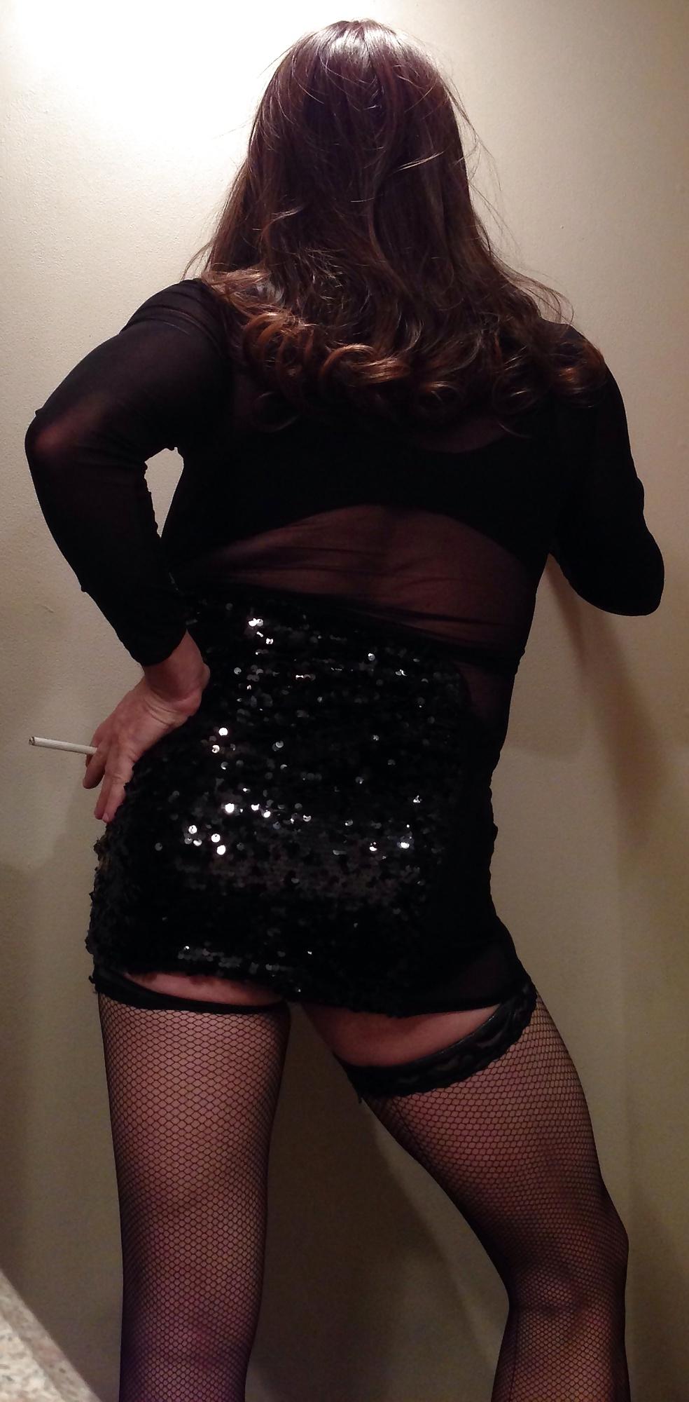 11P New black dress with big tits smoking