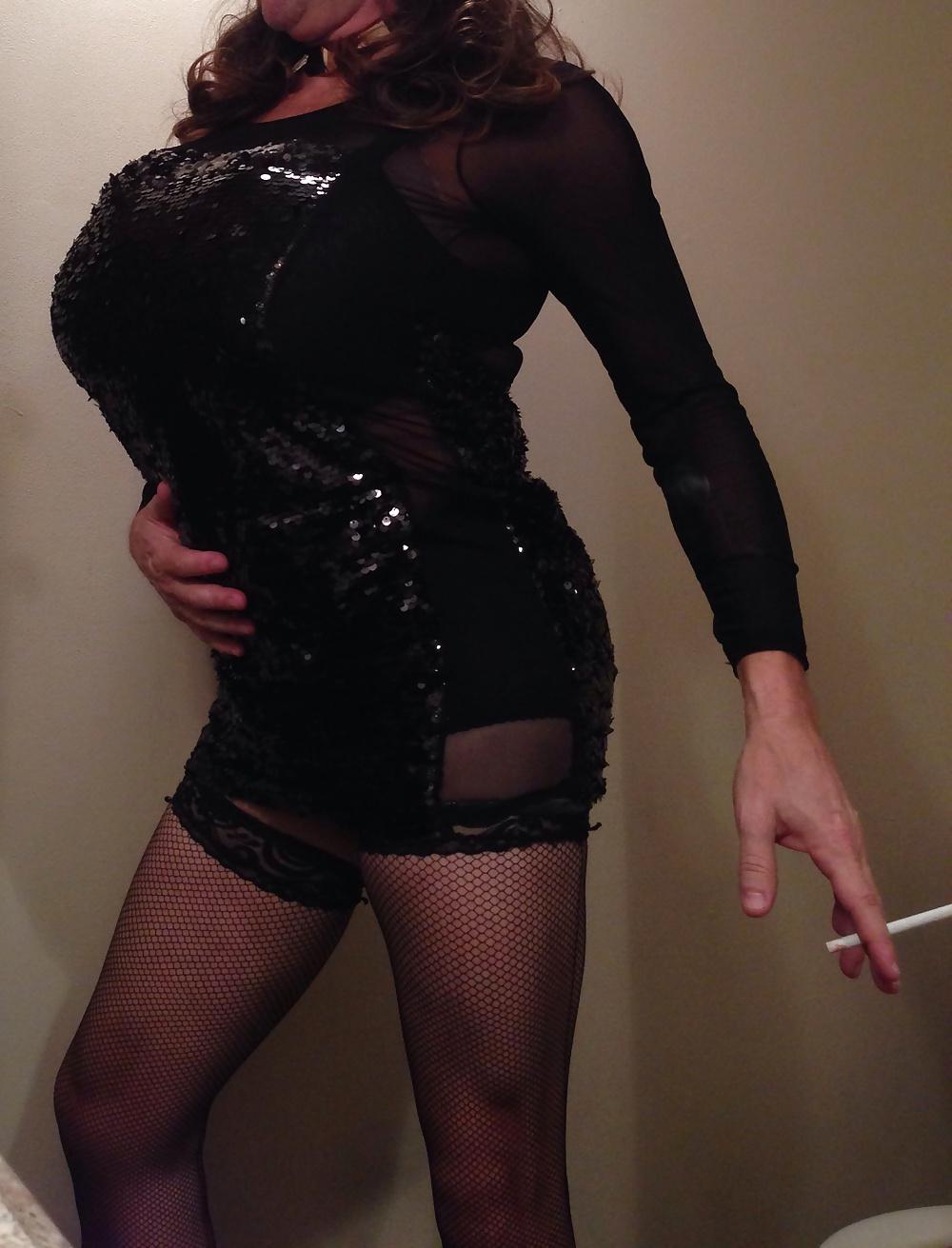 11P New black dress with big tits smoking