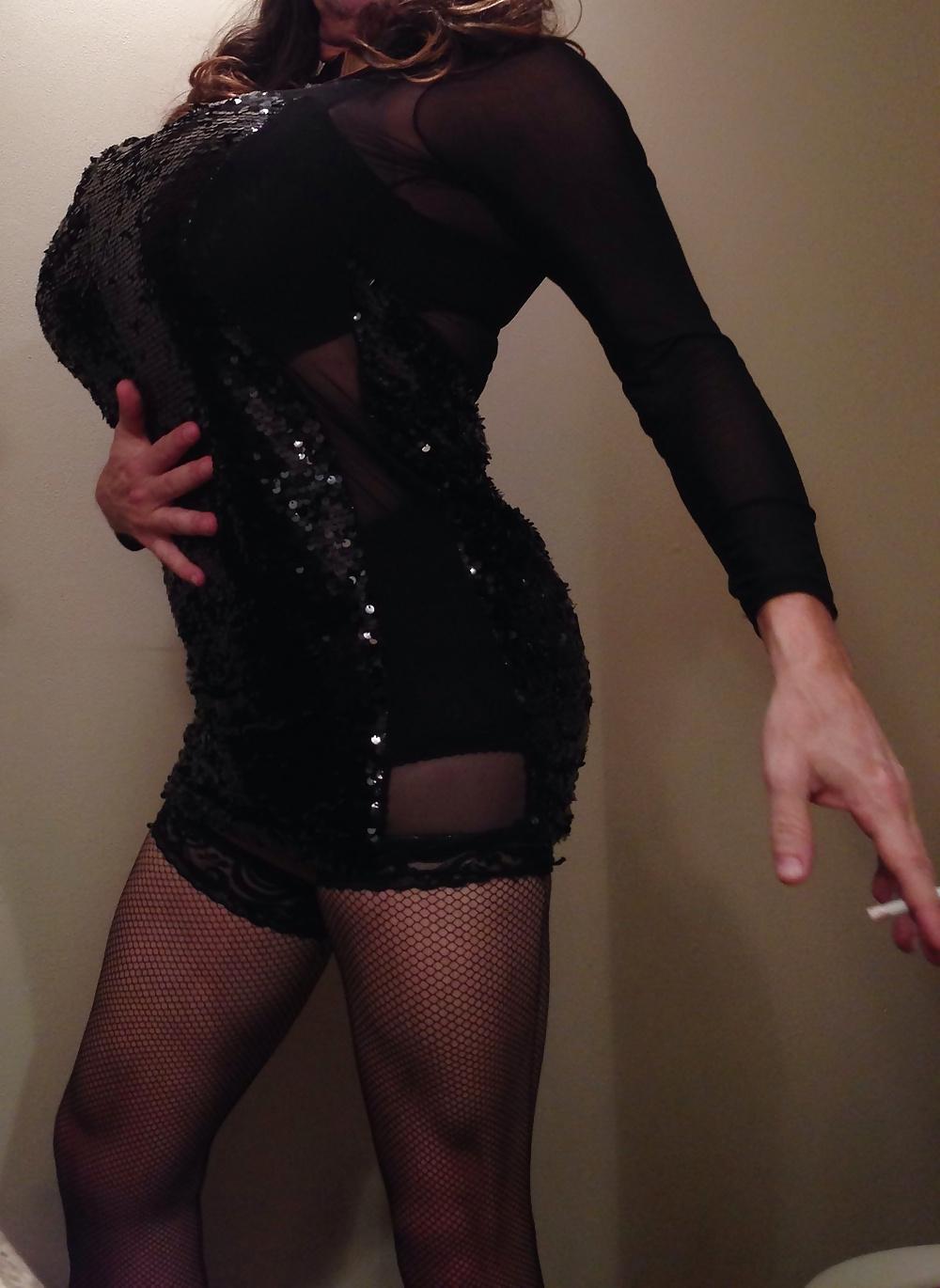 11P New black dress with big tits smoking
