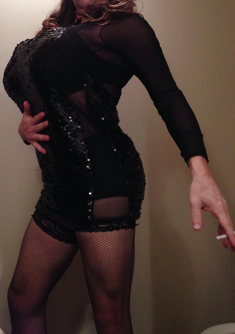 11P New black dress with big tits smoking