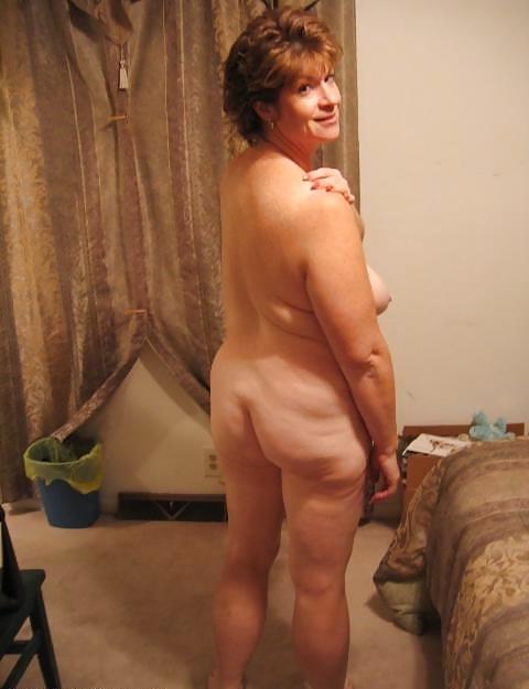 8P Hot lady posing for her husband