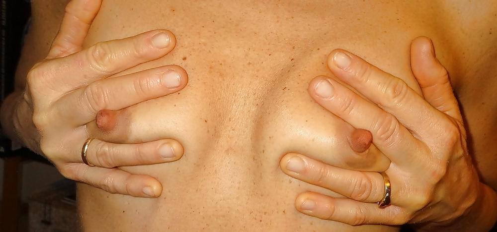 16P Her tits are small but perky nipples