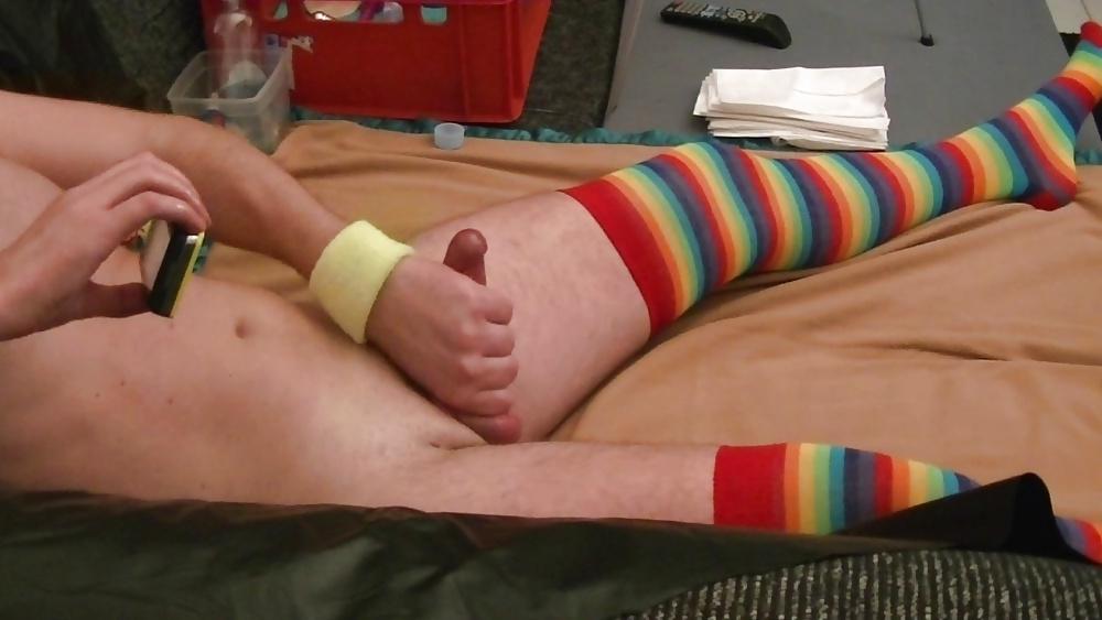 25P Masturbating in oil and rainbow socks