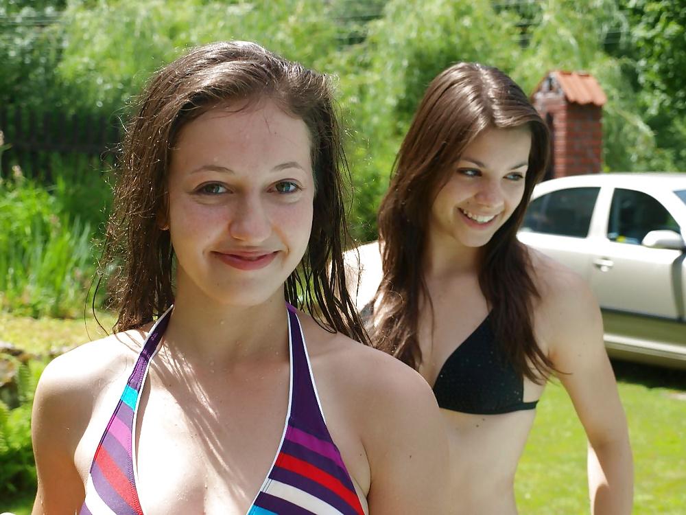 23P Bikini teens in the garden 2