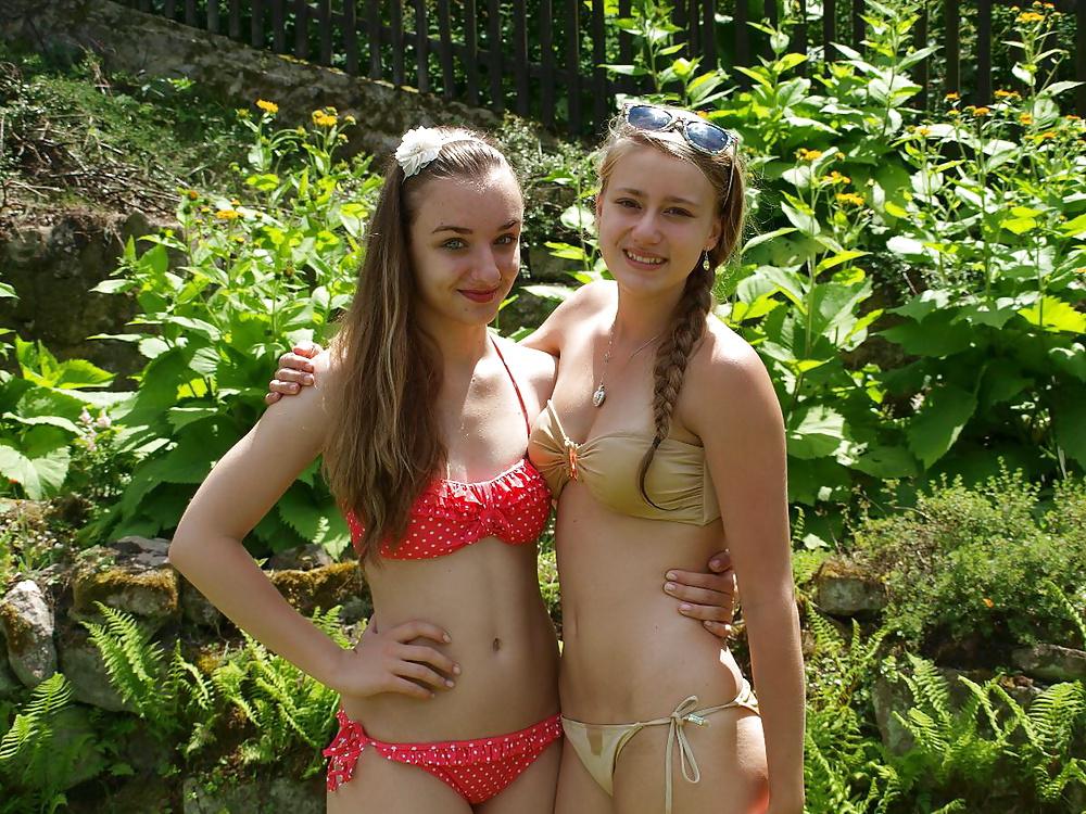 23P Bikini teens in the garden 2