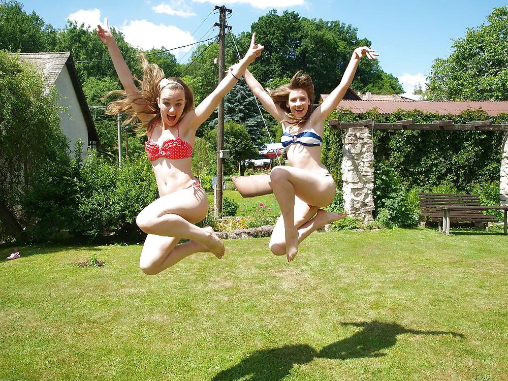 23P Bikini teens in the garden 2