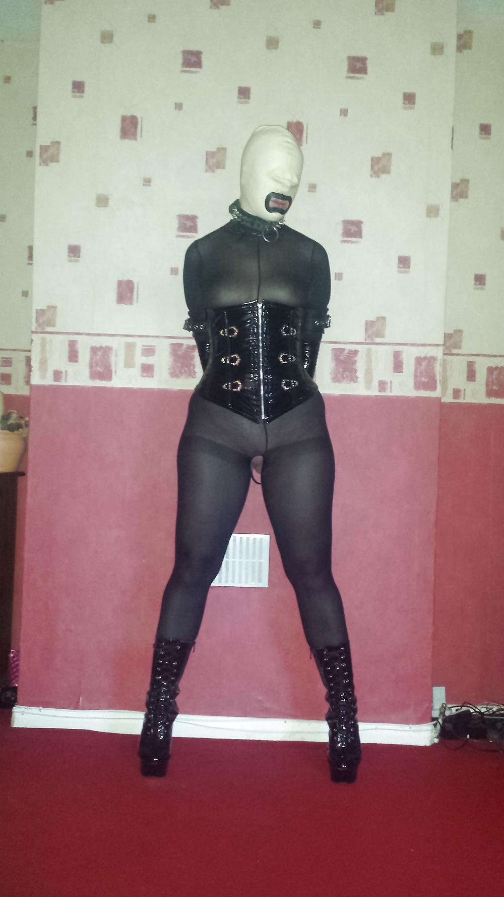8P Slave girl in white rubber hood and ankle boots