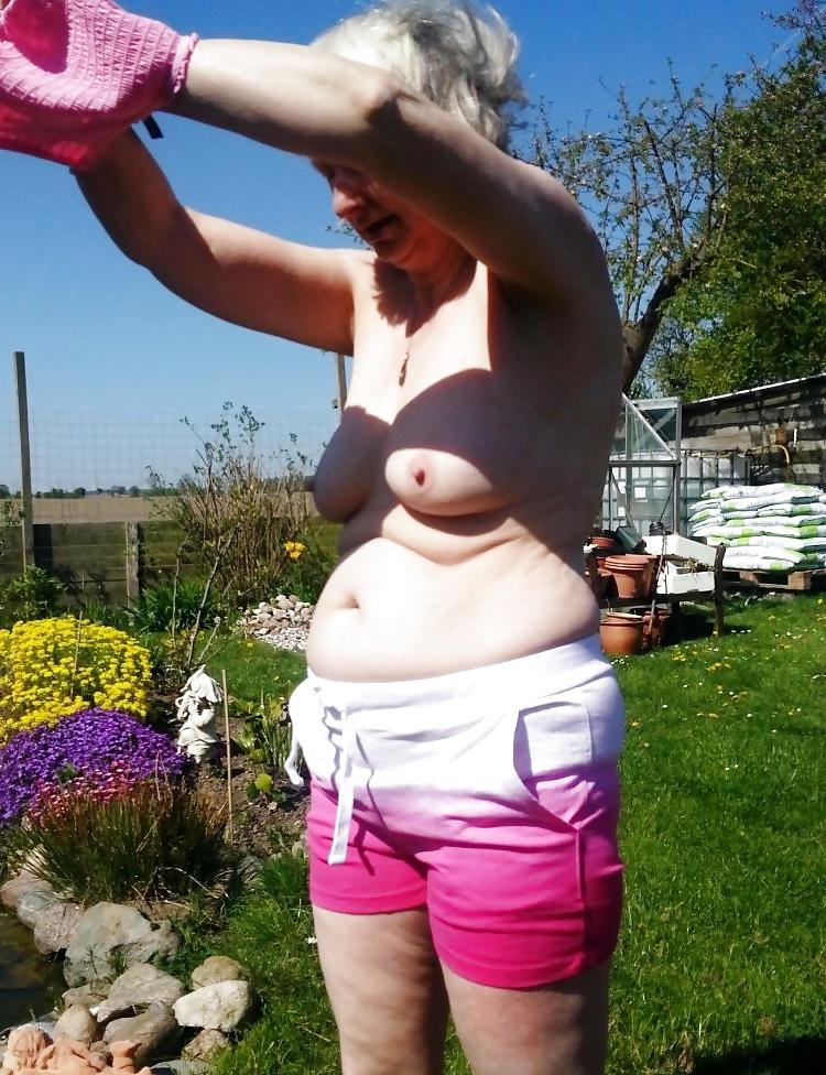 16P Showing my tits in the garden