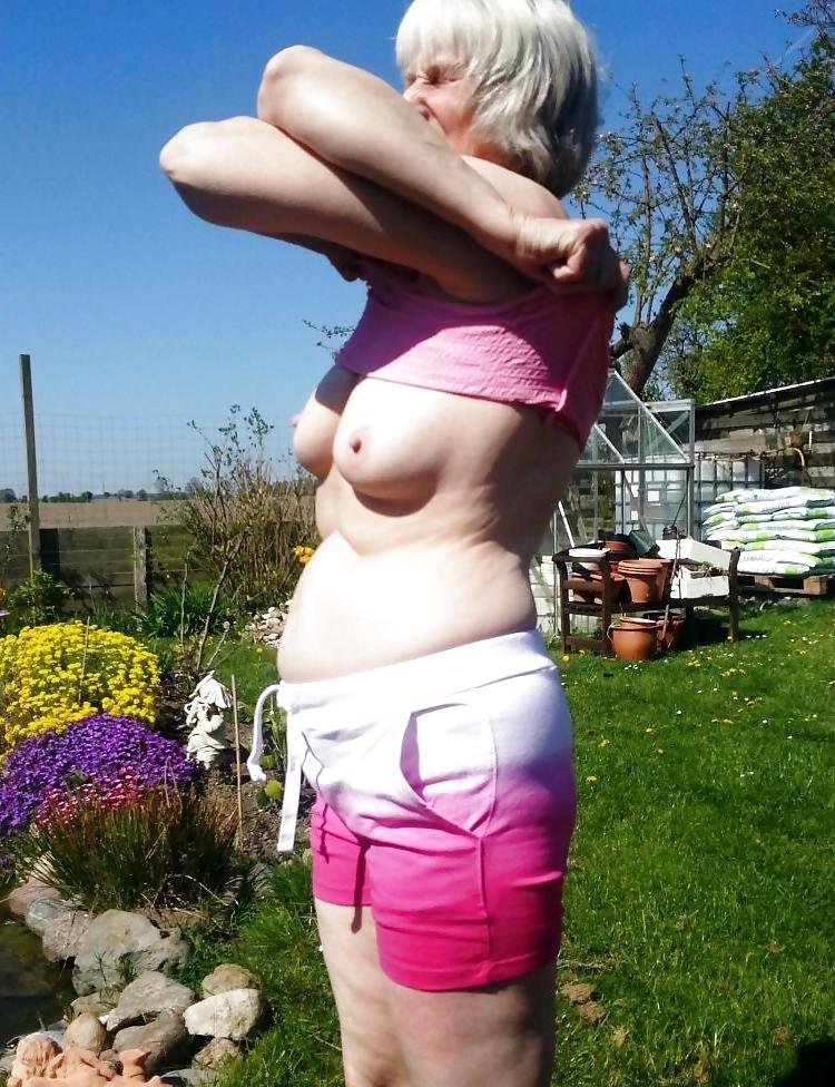 16P Showing my tits in the garden