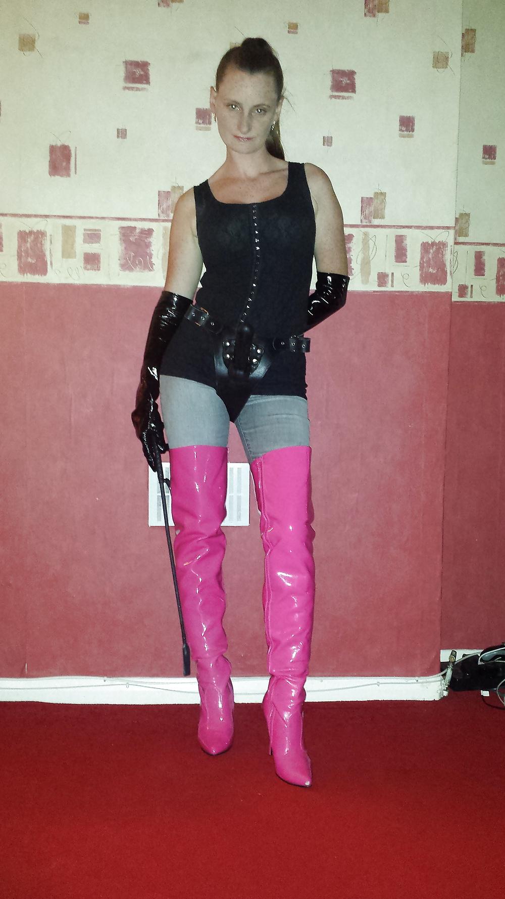 9P Strapon wearing mistress in pink thigh high boots