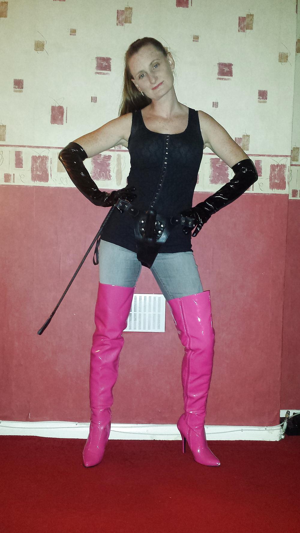 9P Strapon wearing mistress in pink thigh high boots