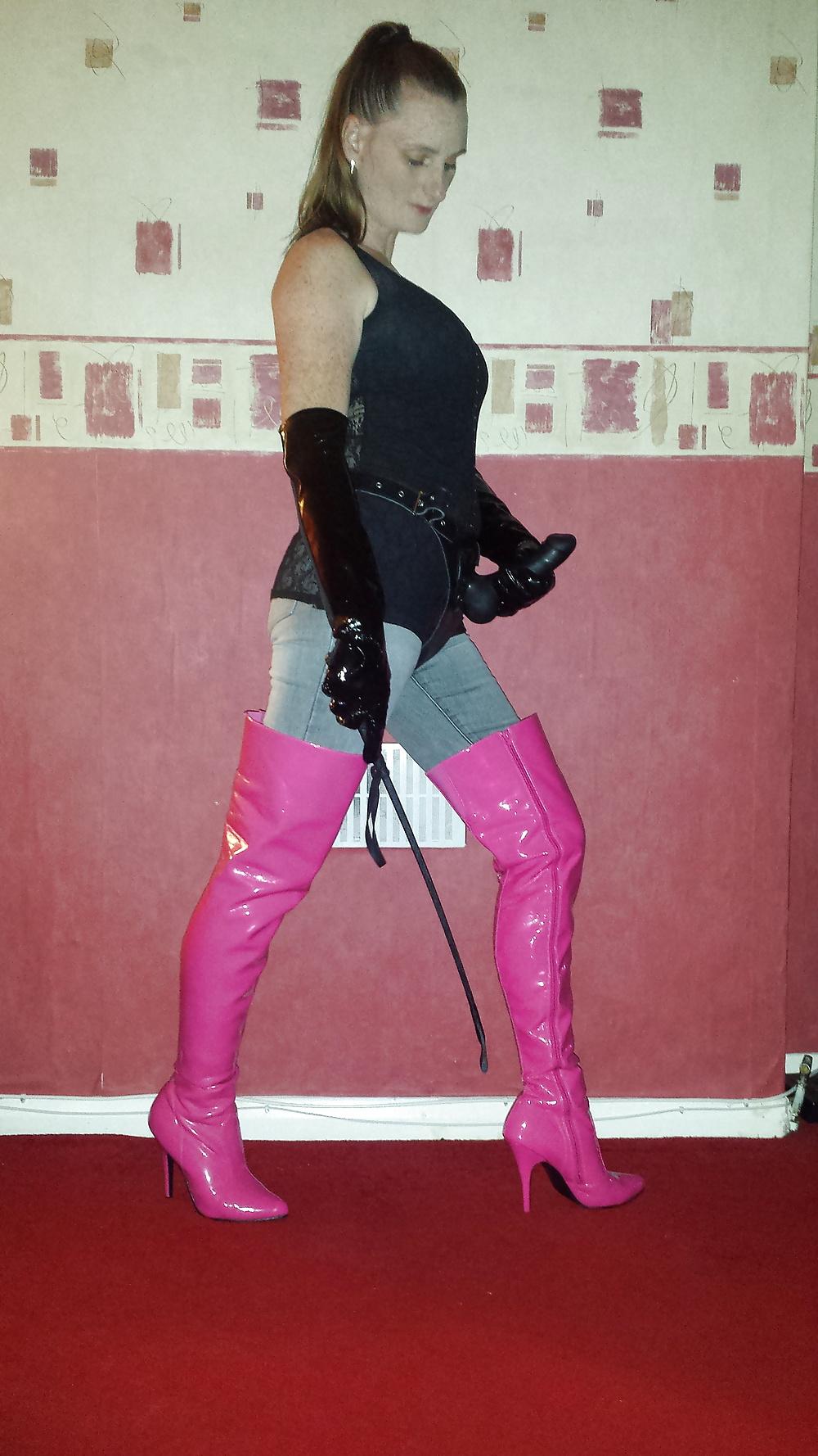 9P Strapon wearing mistress in pink thigh high boots